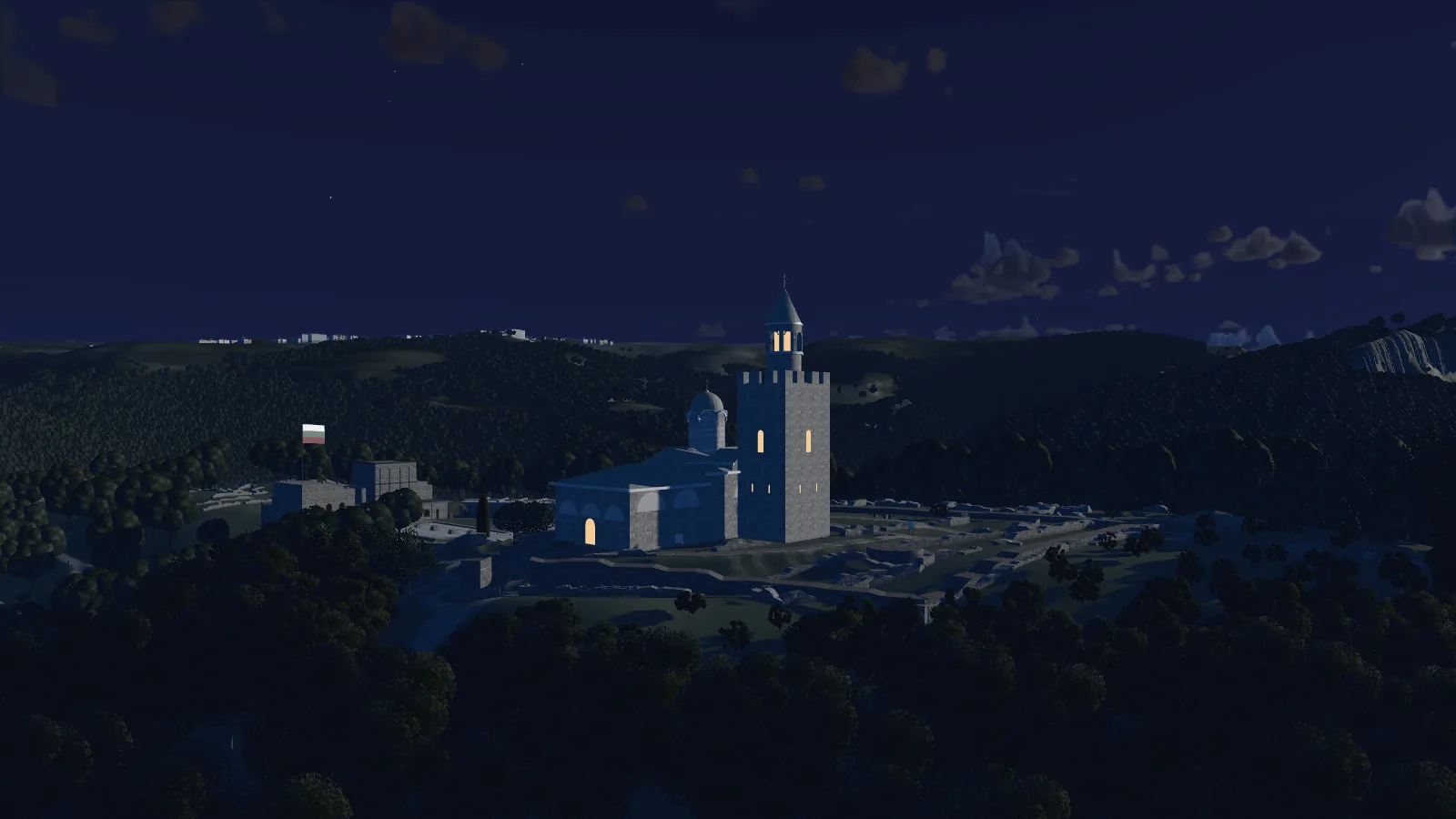 The summit under a full moon, the church pale in the moonlight